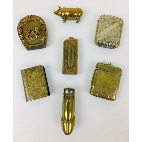 95 - A group of Victorian and later brass novelty and decorative vesta cases, comprising an example model... 