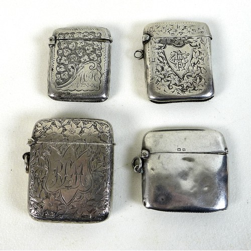 91 - A group of four Victorian and later silver vesta cases, all of rectangular form with hinged lids, co... 