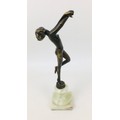 A mid 20th century German bronze figurine of a female nude en attitude, marked to the base, 'Made in... 