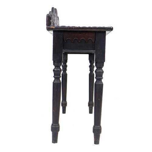 354 - An unusual 19th century ebonised oak side table, the surface and upstand applied with moulding cut i... 