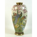 A Japanese Satsuma vase, circa 1930, of shouldered ovoid form, decorated with a peacock standing on ... 