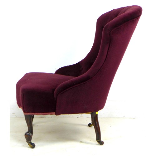 342 - A Victorian nursing chair, bowed button back, serpentine front, upholstered in burgundy velvet, carv... 