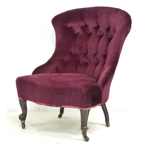 342 - A Victorian nursing chair, bowed button back, serpentine front, upholstered in burgundy velvet, carv... 