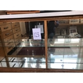 Oak framed glass fronted mirror shop cabinet.