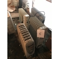 A group of four electric radiators.