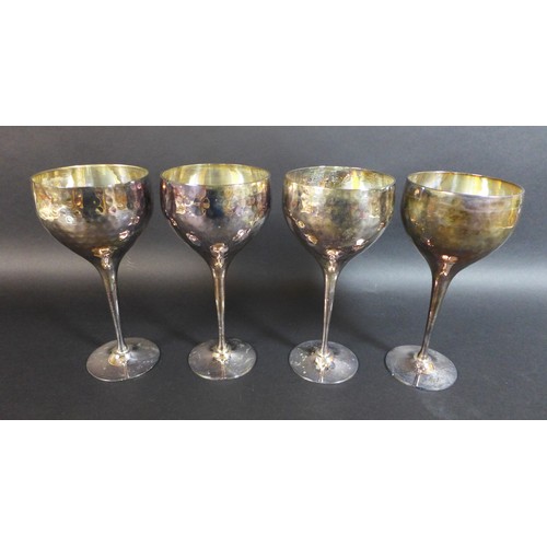 89 - Two pairs of Culinary Concepts silver plated wine goblets, with planished effect decoration, each 20... 