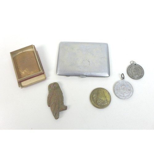 129 - A group of six military related and other detectorist finds, comprising a Nazi Third Reich silver pl... 