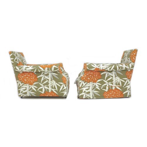 207 - A pair of modern armchairs, upholstered in bright floral fabric, 87 by 93 by 75.5cm high. (2)