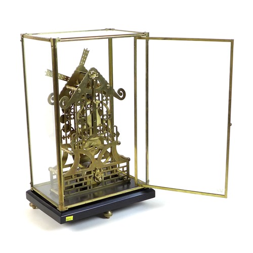 324 - A Trigona brass skeleton clock in the form of a windmill, mid 20th century, with 8 day fusee movemen... 