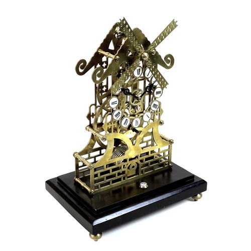 324 - A Trigona brass skeleton clock in the form of a windmill, mid 20th century, with 8 day fusee movemen... 