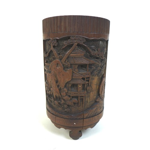 8 - An early 20th century Chinese bamboo brush pot (bitong), of cylindrical form, carved with a landscap... 