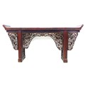 A late 19th century Chinese altar table, the long surface with upturned ends, decorative pierced and... 