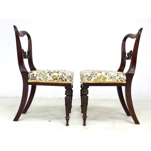 285 - A pair of William IV rosewood dining chairs, shaped backs with carved mid rail, modern embroidered s... 