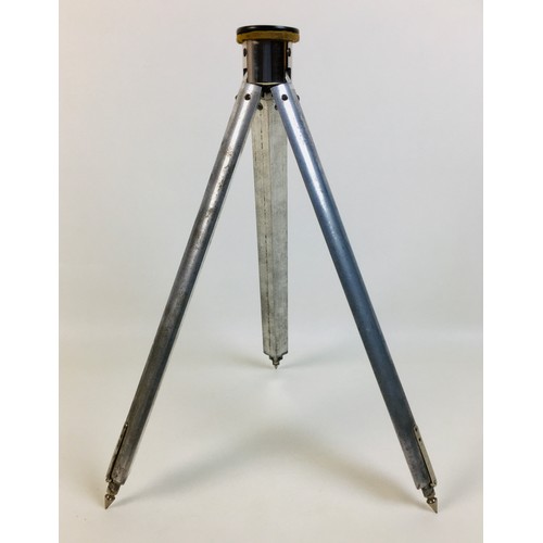 80 - An early to mid 20th century French telescopic tripod, each of the three legs with five slides, stam... 