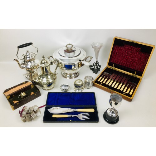 85 - A collection of silver plated and metal items, including a South East Asian white metal cylindrical ... 