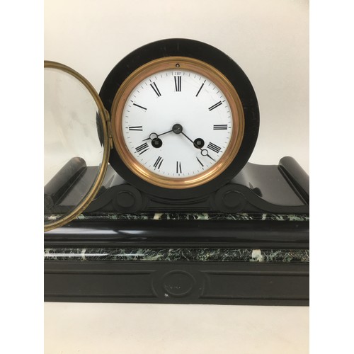 149 - A group of three mantel clocks, comprising a Victorian slate clock, 25 by 35cm, a Victorian white al... 