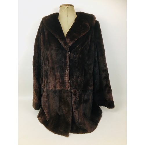 160 - A vintage half length mink coat, labelled 'Serviced by Victor Segall, London', 85cm back length.