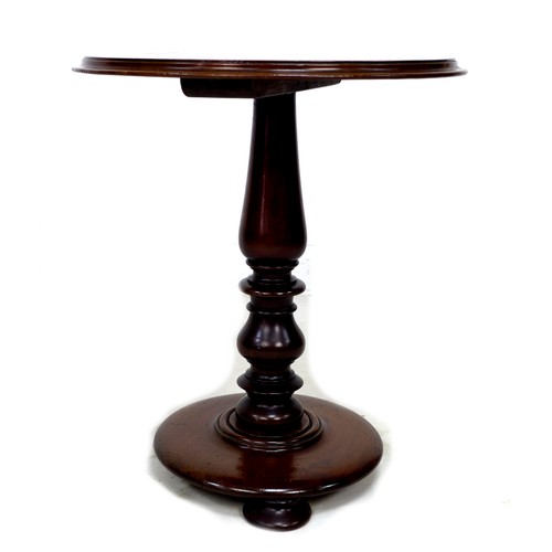 230 - A Victorian mahogany occasional table, circular surface with moulded edge, raised on a turned column... 