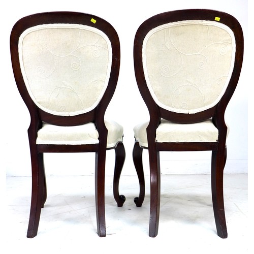 231 - A pair of Victorian mahogany bedroom chairs, with moulded frames, cabriole front legs, modern cream ... 