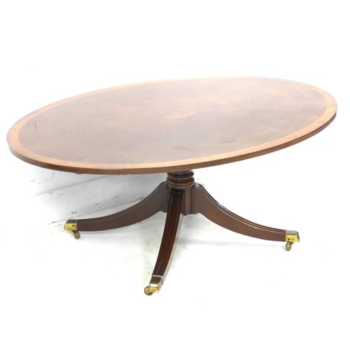 268 - A modern reproduction coffee table, in Regency style with fan veneered and burr walnut crossbanded o... 