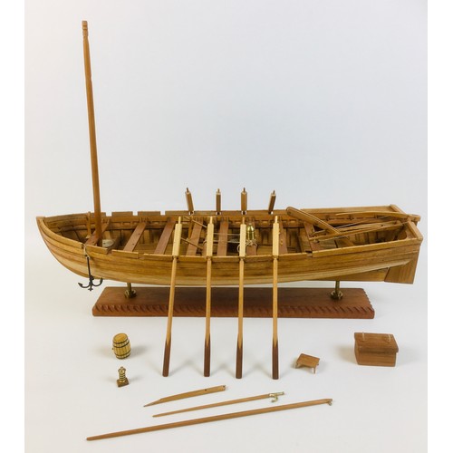 161 - A scratch built wooden model of a large sailing rowboat, with provision for up to sixteen oars, but ... 