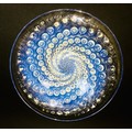 A Rene Lalique 'Volutes' clear and opalescent glass bowl, with spiralling dot design, signed 'R. Lal... 