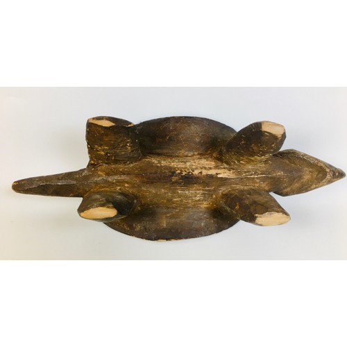 99 - A group of five tribal carved wooden items, comprising a small Ethiopian tripod stool, with circular... 