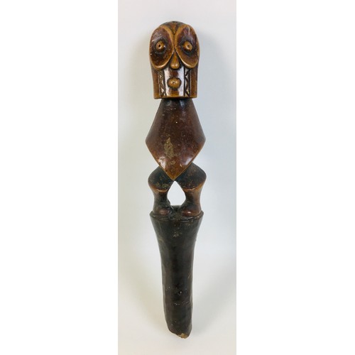 101 - An African tribal staff figure head piece, possibly Bembe, 31cm long, together with five tribal staf... 