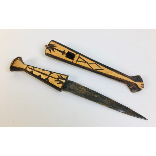 103 - Two African tribal knives, possibly Namibian Ovambo tribe, both with ebonised wooden handles and she... 