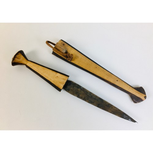 103 - Two African tribal knives, possibly Namibian Ovambo tribe, both with ebonised wooden handles and she... 