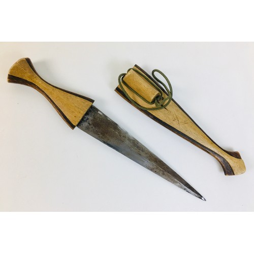 103 - Two African tribal knives, possibly Namibian Ovambo tribe, both with ebonised wooden handles and she... 