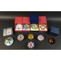 A group of ten paperweights, comprising a Millefiore limited edition Pheonix Paperweights Ltd weight... 