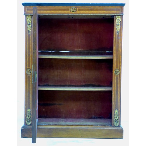 256 - A 19th century walnut pier cabinet, possibly French, the single glazed doors enclosing two shelves, ... 