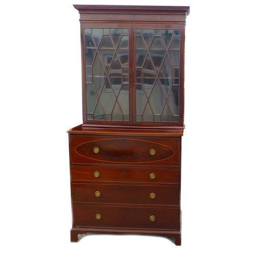 330 - A George III mahogany secretaire bookcase, the twin astragal glazed doors enclosing three shelves, t... 