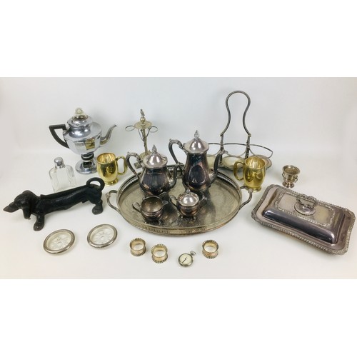 88 - A collection of silver plated and metal items, including an electric kettle, a pair of tankards, dec... 