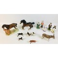 A collection of thirteen Beswick figurines, including a fox, 10 cm by 3.3 by 5.5cm high, two hounds,... 