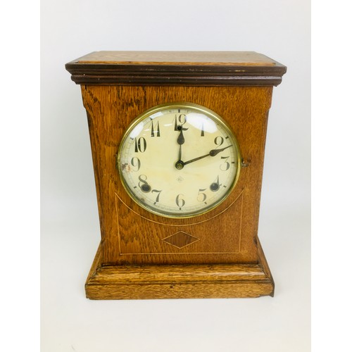 153 - A Victorian slate mantle clock, R. Russell with Roman numeral dial, eight day movement, 24 by 15 by ... 