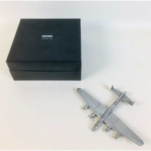 164 - A die-cast Corgi toys Precision Model of a WWII Avro Lancaster Bomber, with original box, stand and ... 