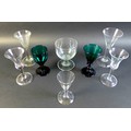 A collection of 18th and 19th century drinking glasses, comprising four Georgian glasses, each with ... 