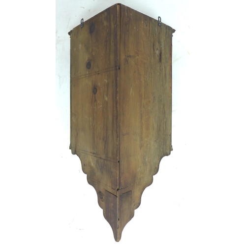 327 - A Continental early 19th century mahogany corner cupboard, single flat fronted door to canted sides ... 