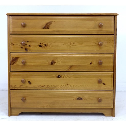 219 - A modern pine chest of five drawers with turned handles, 96 by 51 by 90cm high.