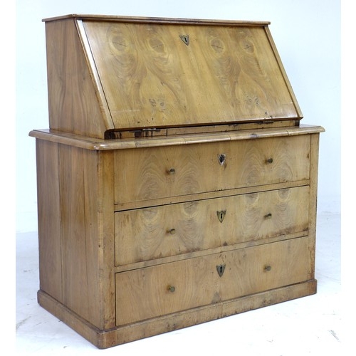 315 - A Scandinavian 19th century walnut bureau, of block form with fall front enclosing a fitted interior... 