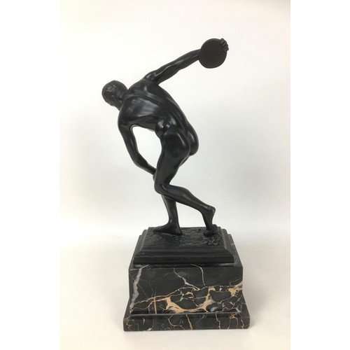 97 - After the Antique: a bronze figural sculpture, modelled as a discus thrower, on stepped marble base ... 