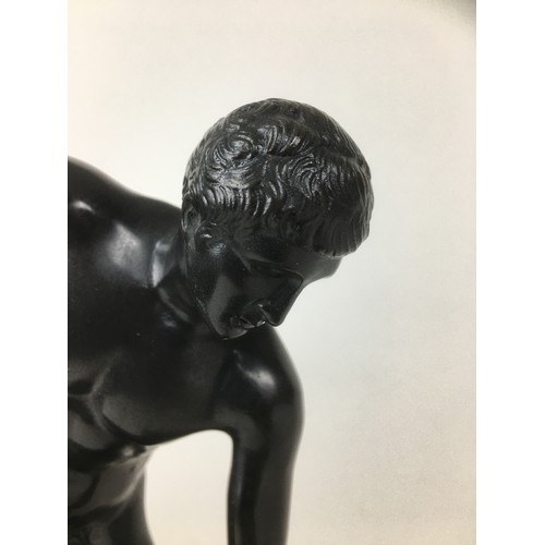 97 - After the Antique: a bronze figural sculpture, modelled as a discus thrower, on stepped marble base ... 