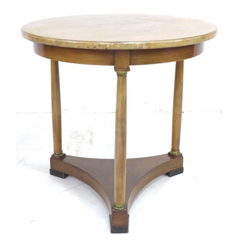 317 - A Continental late 19th century mahogany occasional table, the circular surface raised on three colu... 