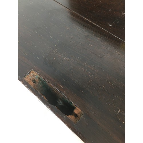 109 - A 19th century mahogany writing slope, with brass fittings including side campaign style handles and... 