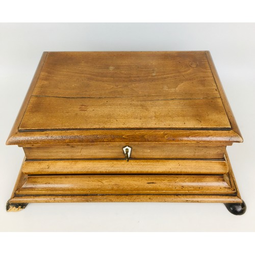 111 - Three 19th century wooden boxes, comrpising a Georgian walnut tea caddy, with a domed top, its inter... 