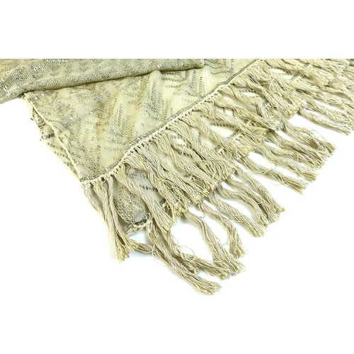 146 - A vintage Egyptian Assuit shawl, circa 1930, the cream net ground decorated with stylised figures an... 