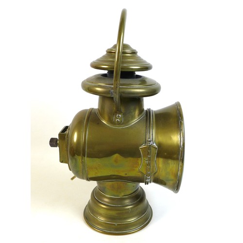 77 - A French early 20th century brass lantern motoring headlamp, later converted to an electric table la... 