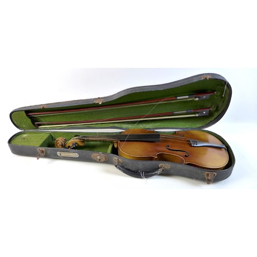 121 - An early 20th century full size 4/4 violin with ebonised fingerboard, tailpiece and tuning pegs, no ... 